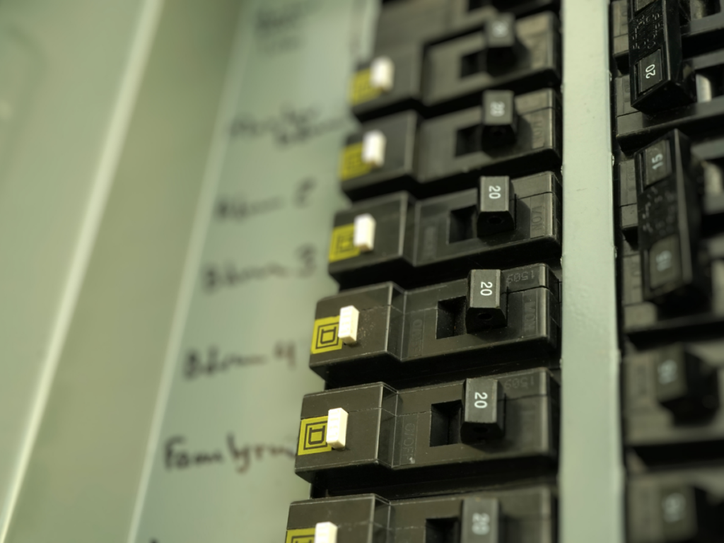 close up of 20 amp circuit breakers labeled