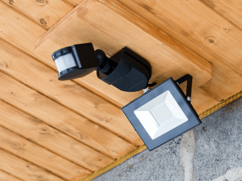 motion sensor light installed on outside of house