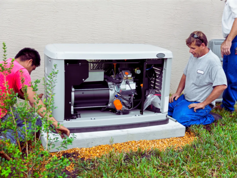 team of electrician in the middle of installing a whole home generator